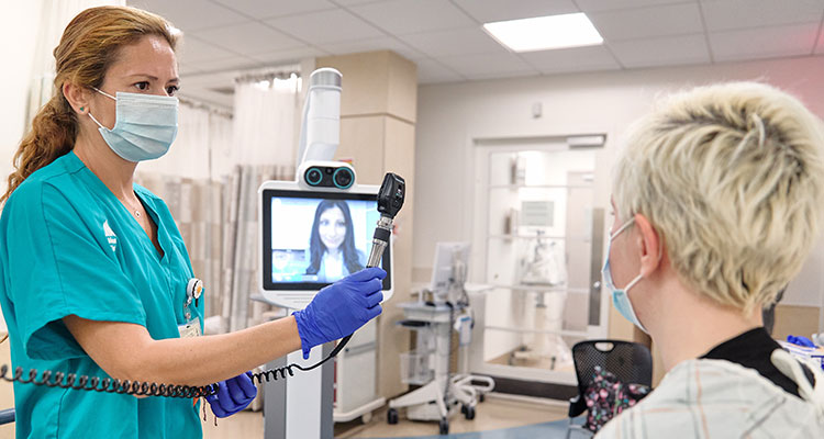 Image of nurse with patient