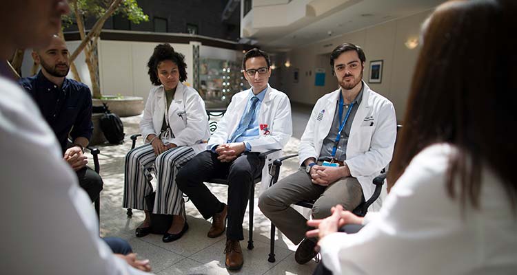 Neurology Residents and Medical Students on Morning Consult Rounds with Program Director Dr. Michelle Fabian