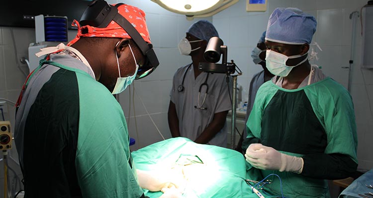 Image of doctors performing surgery